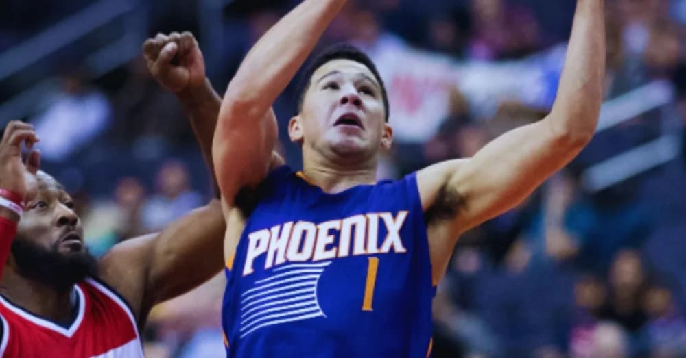 Devin Booker Leads Suns Past Warriors in Victory