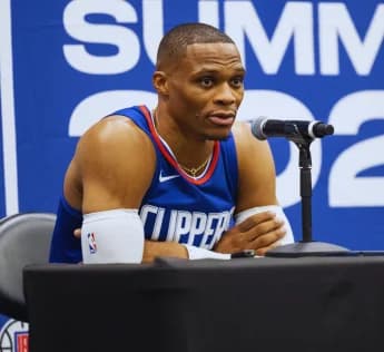 Russell Westbrook Clashes with Fan in Heated Altercation: Protecting His Honor or Overreacting?