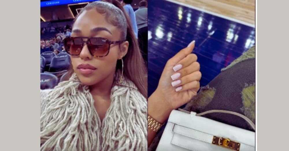 Jordyn Woods’ Luxury Statement: Hermes Bag Steals Spotlight at Timberwolves Game